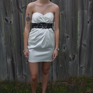 Elegant white and black lace dress